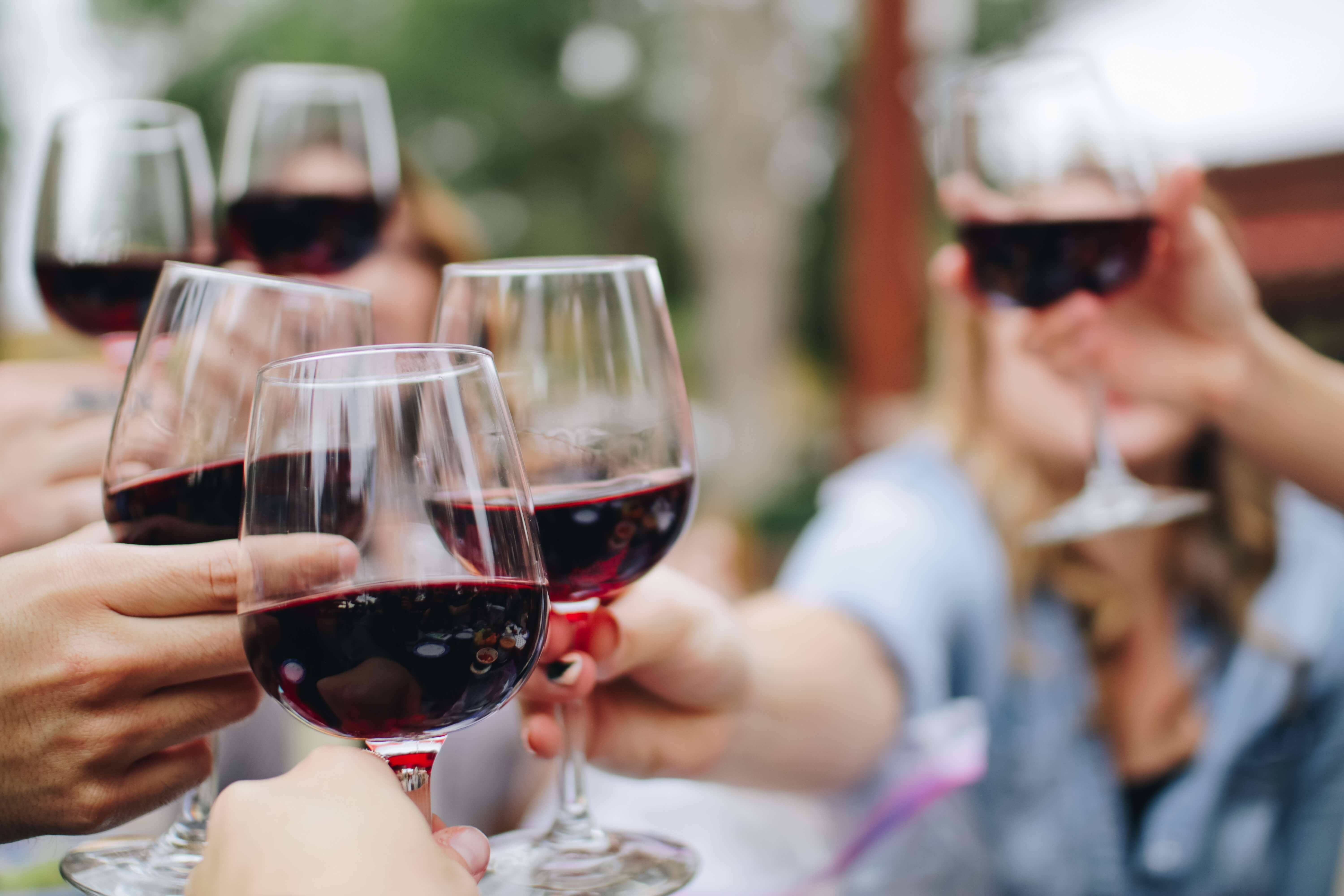 Wine glasses toasting